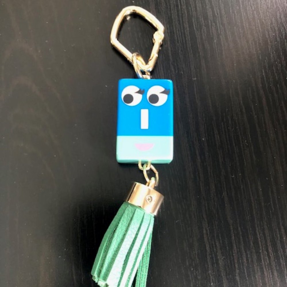 Brand new Fossil face tassel keyfob